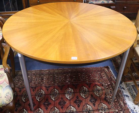 A mid century circular starburst dining table, Diam. 117cm
